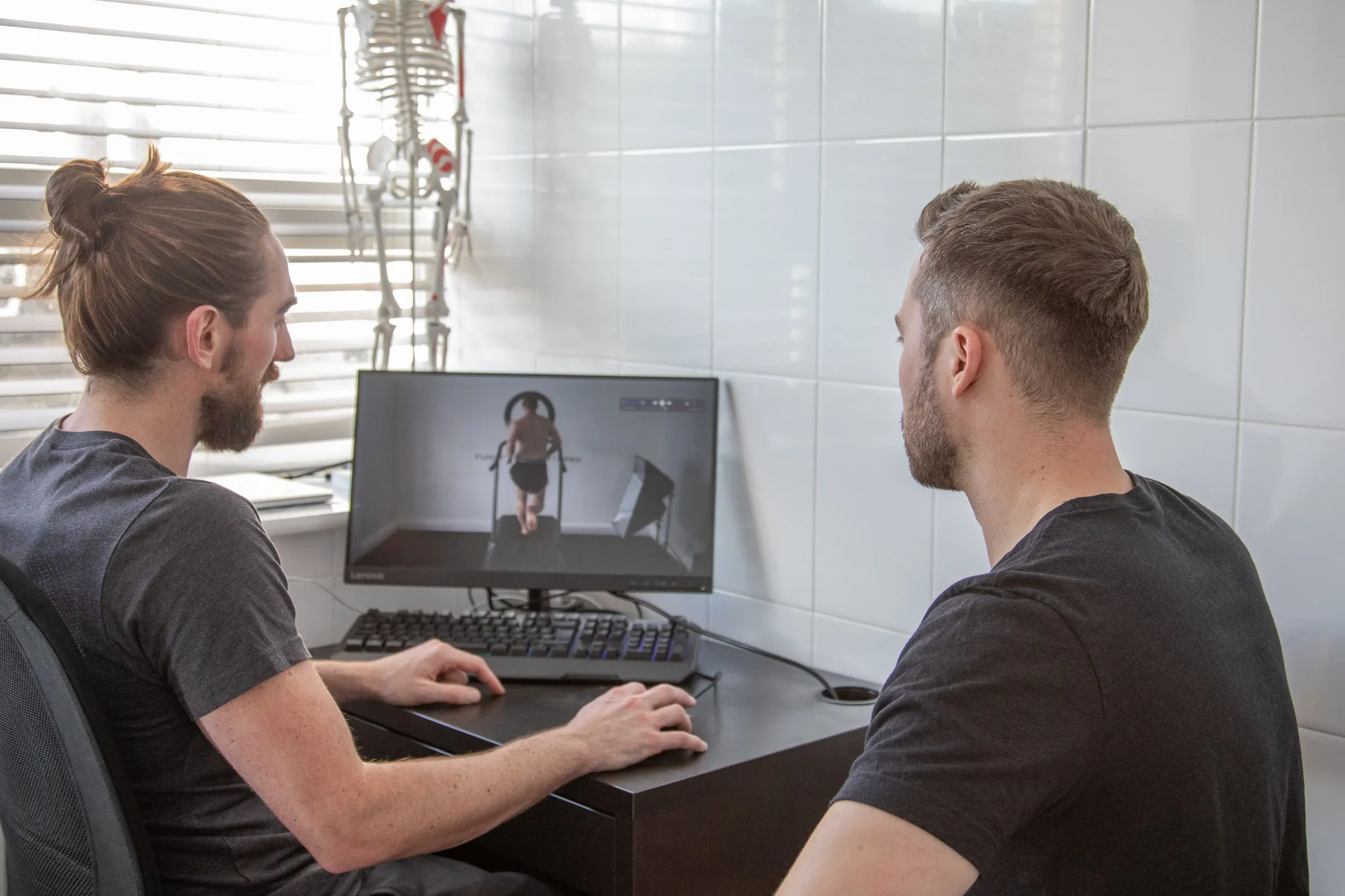 Reviewing a gait analysis on screen with a client